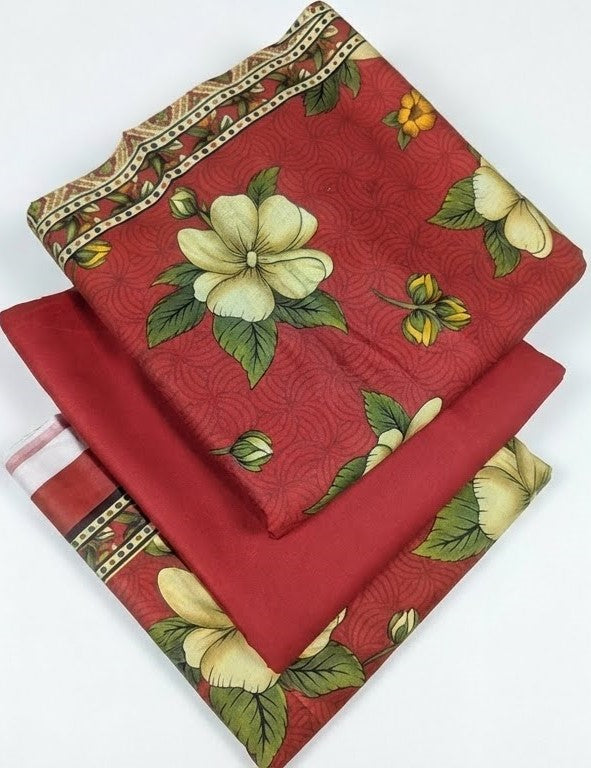 Red fabric with floral patterns on a white background