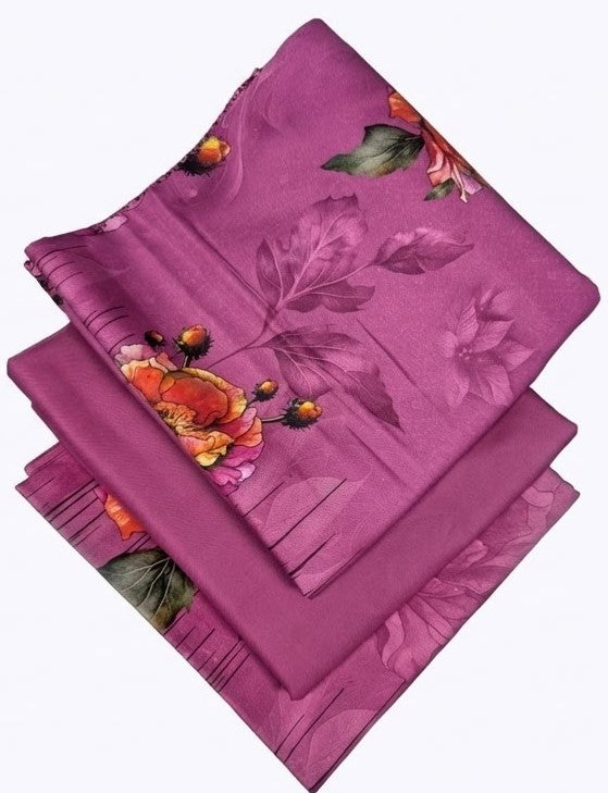 Stack of pink fabric with floral embroidery on a white background