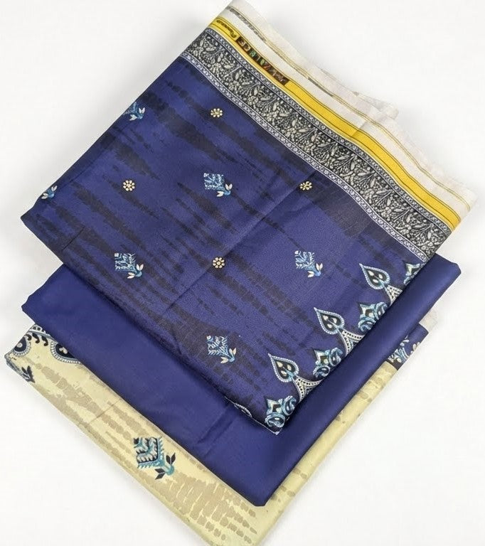 Stack of patterned fabric pieces on a white background