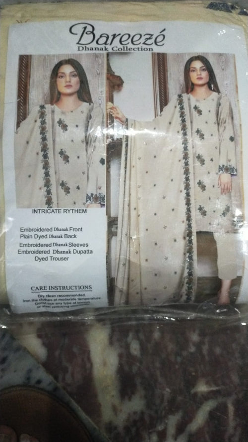 Bareeze Dhanak Collection packaging with a woman wearing a traditional outfit.